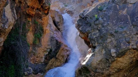 Beautiful large waterfall with splashes in a slow motion. Stock Footage 193136324