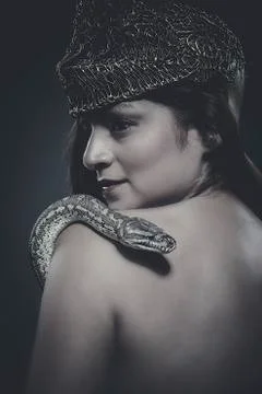 Beautiful latin woman with python snake Stock Photos