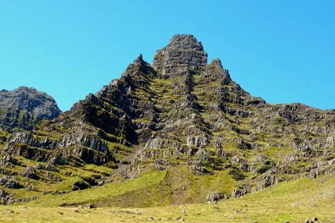 Beautiful layer of rock formations on top of the mountains near East Fjords,  Stock Photos