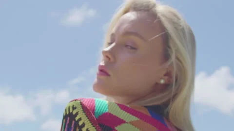 Beautiful layout of the model against the background of the city and clouds Stock Footage 154088094