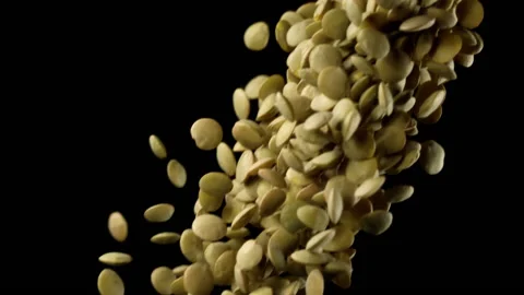 Beautiful lentils falling in slow motion Stock Footage 151108901