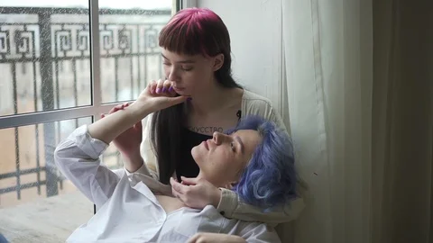 Beautiful lesbian women are touching and... | Stock Video