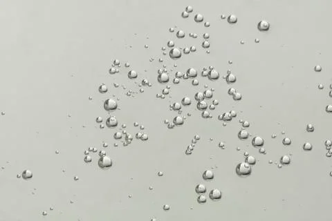 Beautiful light air bubbles soars over a blurred gackground Stock Photos