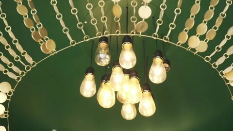 Beautiful light chandelier on the ceiling in a small hotel Stock Footage 247448680