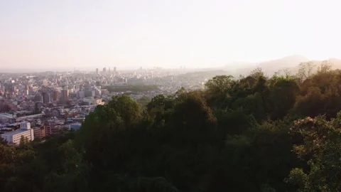 Beautiful light on this elevated cityscape of Kobe in Japan. Dense buildings Stock Footage 130335096