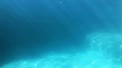 Beautiful light rays underwater Stock Footage 100982516