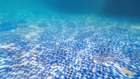 Beautiful light refraction and shadow effects under swimming pool water Stock Footage 344831945