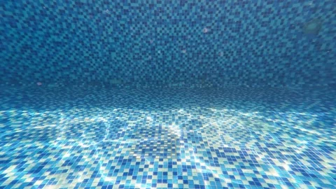 Beautiful light refraction and shadow effects under swimming pool water Stock Footage 344832032