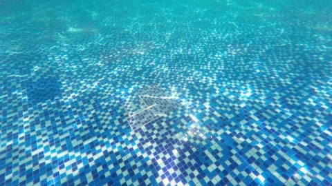 Beautiful light refraction and shadow effects under swimming pool water Stock Footage 344832172