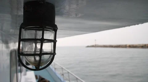 Beautiful light on the side of a moving boat Stock Footage 2165498