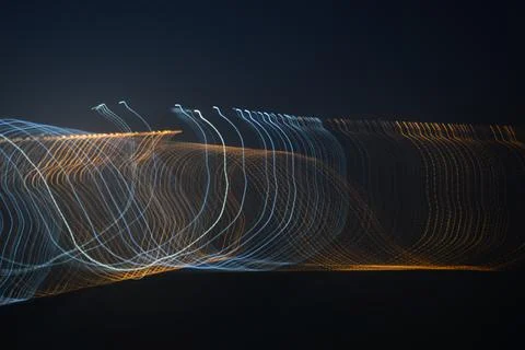 Beautiful light waves with dark background Stock Photos