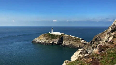 The beautiful lighthouse of South Stack on the Isle of Anglesey in North Wales Stock Footage 154319545