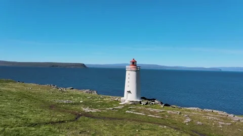 A beautiful lighthouse standing on a cliff Video stock 138314347