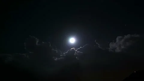 Beautiful Lightning and Full Moon and Clouds at Night Stockbeeldmateriaal 208935715