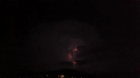 Beautiful Lightning Strikes and Cloud at Night Stockbeeldmateriaal 195655334