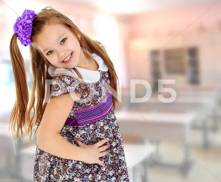 Beautiful little girl with long hair Stock Photos