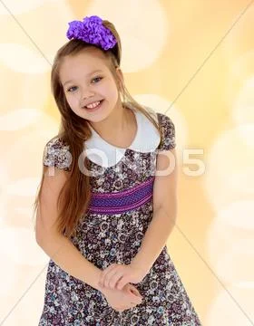 Beautiful little girl with long hair Stock Photos