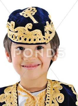 Beautiful little kid wearing bosnian traditional clothes and hat Stock Photos