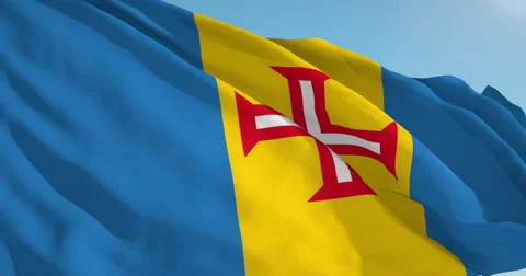 Beautiful looping flag blowing in wind: Madeira Islands Stock Footage 63143699