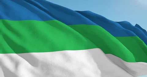 Beautiful looping flag blowing in wind: Komi Video stock 63149258