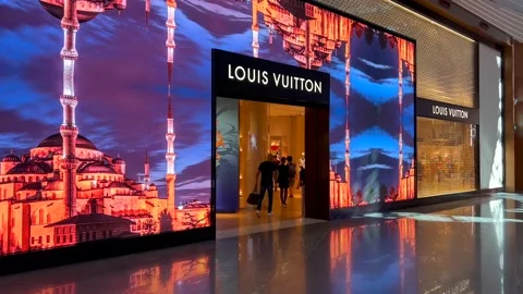 Louis Vuitton storefront graffiti in sup, Stock Video