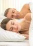 The beautiful lovers couple lie on the bed Photo