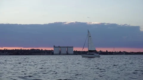 Beautiful low angle panorama view on cloudy evening sunset sky over small Stock Footage 93050379