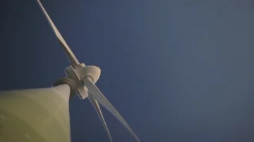 Beautiful low angle shot of a windmill on a summer day Stock Footage 85561657