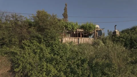 Beautiful low angle view of a seaside house on a sunny day Stock Footage 310946354