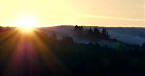 Beautiful low clouds passing over mountains and valley Stock Footage 47001119