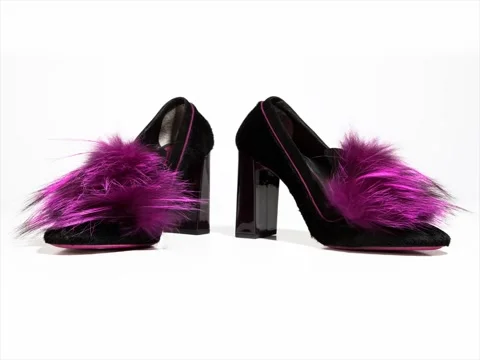 Beautiful luxurious black suede high-heeled shoes with purple fur, fur moves Stock Footage 80336679