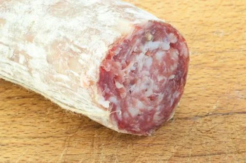 Beautiful macro background of a salami on a cutting board Stock Photos