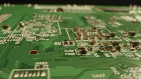 Beautiful macro of a clean circuit board in a dark studio Stock Footage 315630437