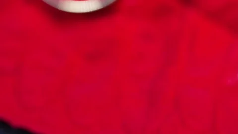 Beautiful macro close up of gold ring with diamond rotating on red leaf Video stock 70244595