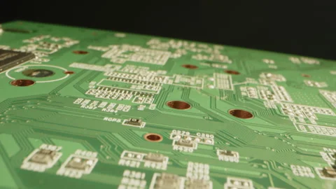 Beautiful macro dolly out of a green circuit board in a dark studio Video stock 315630244