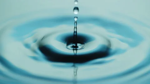 Beautiful macro slow motion water drop blue Stock Footage 158408918