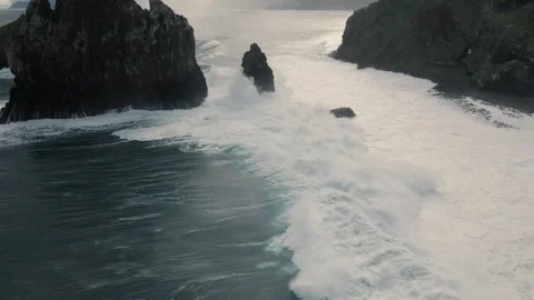 Beautiful madeira atlantic ocean waves crash against majestic rock formations Stock Footage 321522334