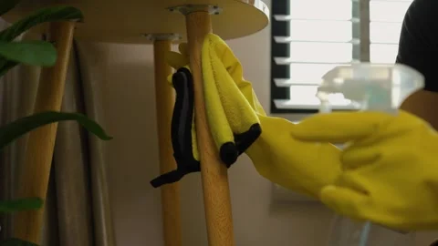 A beautiful maid is getting ready to clean the house, a maid is getting ready to Stock Footage 296670208