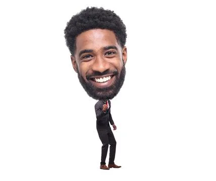 Beautiful man in front of a white background with a big Head Stock Photos