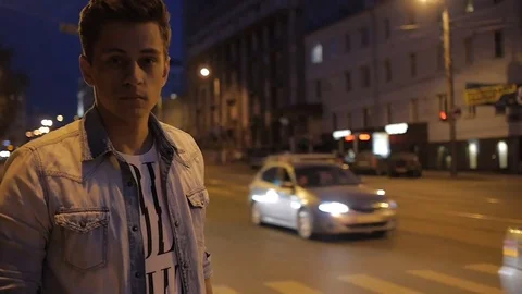 Beautiful man model posing near the road Video stock 72838975