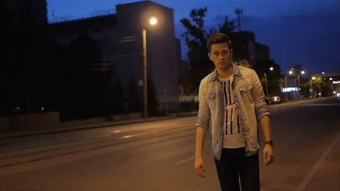 Beautiful man model posing near the road Stock Footage 72839058