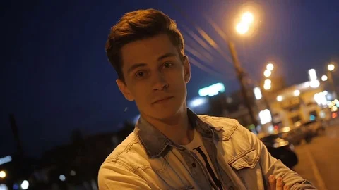 Beautiful man model posing near the road Video stock 72839158