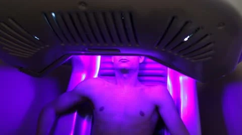Beautiful man in solarium Video stock 21439487