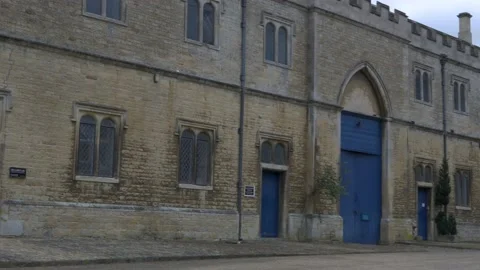 Beautiful mansion stable house with empty yard. Hand held panning shot Stock Footage 134789607