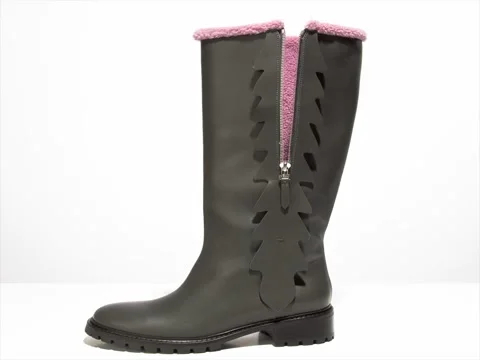 A beautiful marsh boot with pink fur inside, a zipper opens Stock Footage 80336676