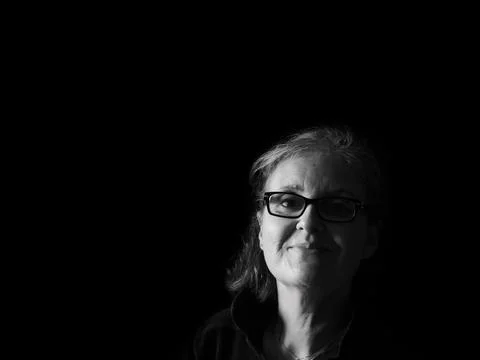 A beautiful middle aged lady posing for the camera Stock-Fotos