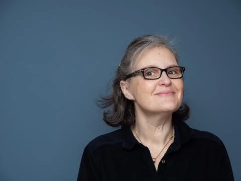 A beautiful middle aged lady posing for the camera Stock Photos