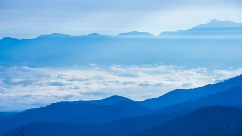 Beautiful Mist Floating Around Valleys 4K Time Lapse (zoom in) Stock Footage 101190499