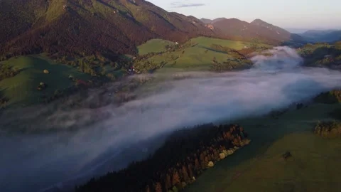 Beautiful misty and cloudy fast moving aerial view. The misty sea in the spring Stock Footage 196488128