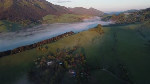 Beautiful misty and cloudy fast moving aerial view. The misty sea in the spring Stock Footage 201162031